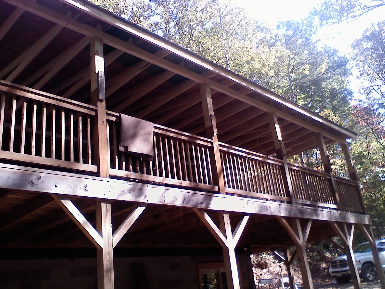Timber framing under a new elevated porch and deck — Roof Leak Repair in Monroe by Roofing Brothers